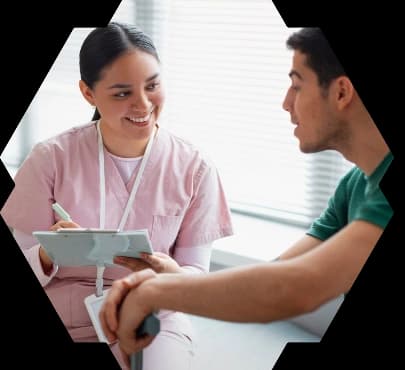 Healthcare provider speaking with a patient
